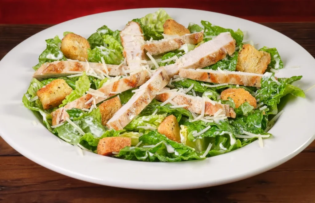 Classic Chicken Caesar Salad with romaine, Parmesan, and croutons