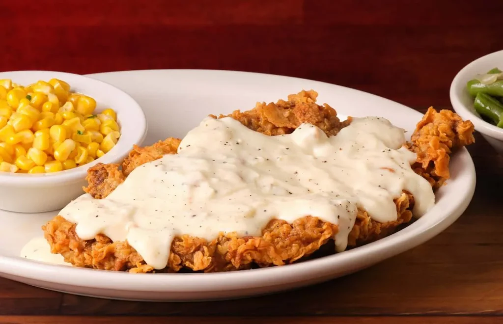crispy fried sirloin topped with white gravy served with buttered corn