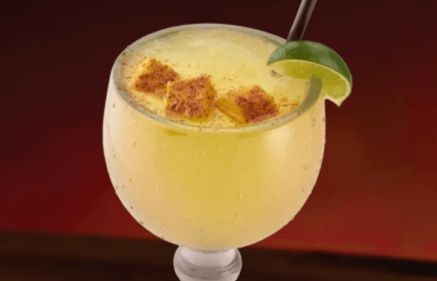 Mango Margarita with mango slice garnish