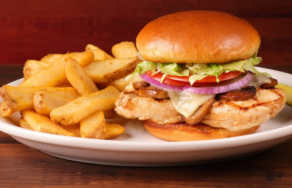 mushroom jack chicken sandwich with fries 