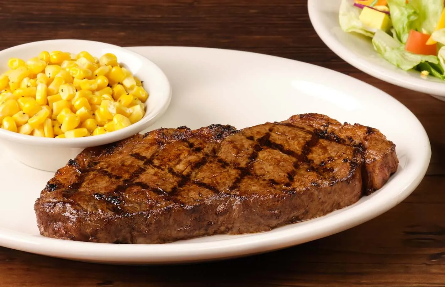 Hand-cut New York Strip steak, char-grilled to order, rich flavor