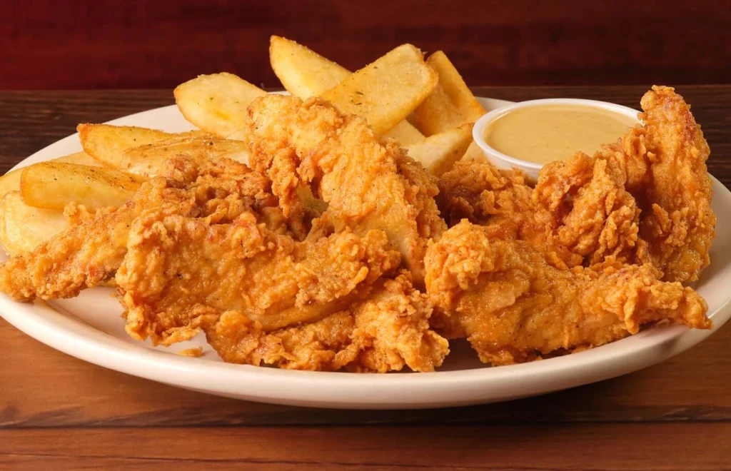 Ranger meal chicken critters basket served with fries and dip sauce 