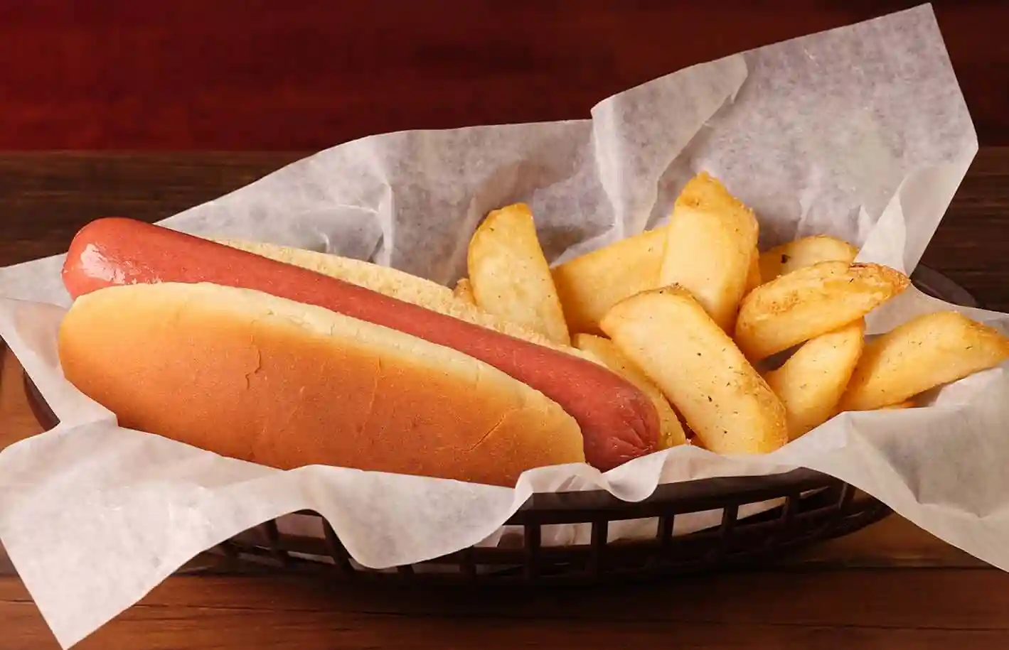 home page 79 All Beef Hot Dog with fries in a basket