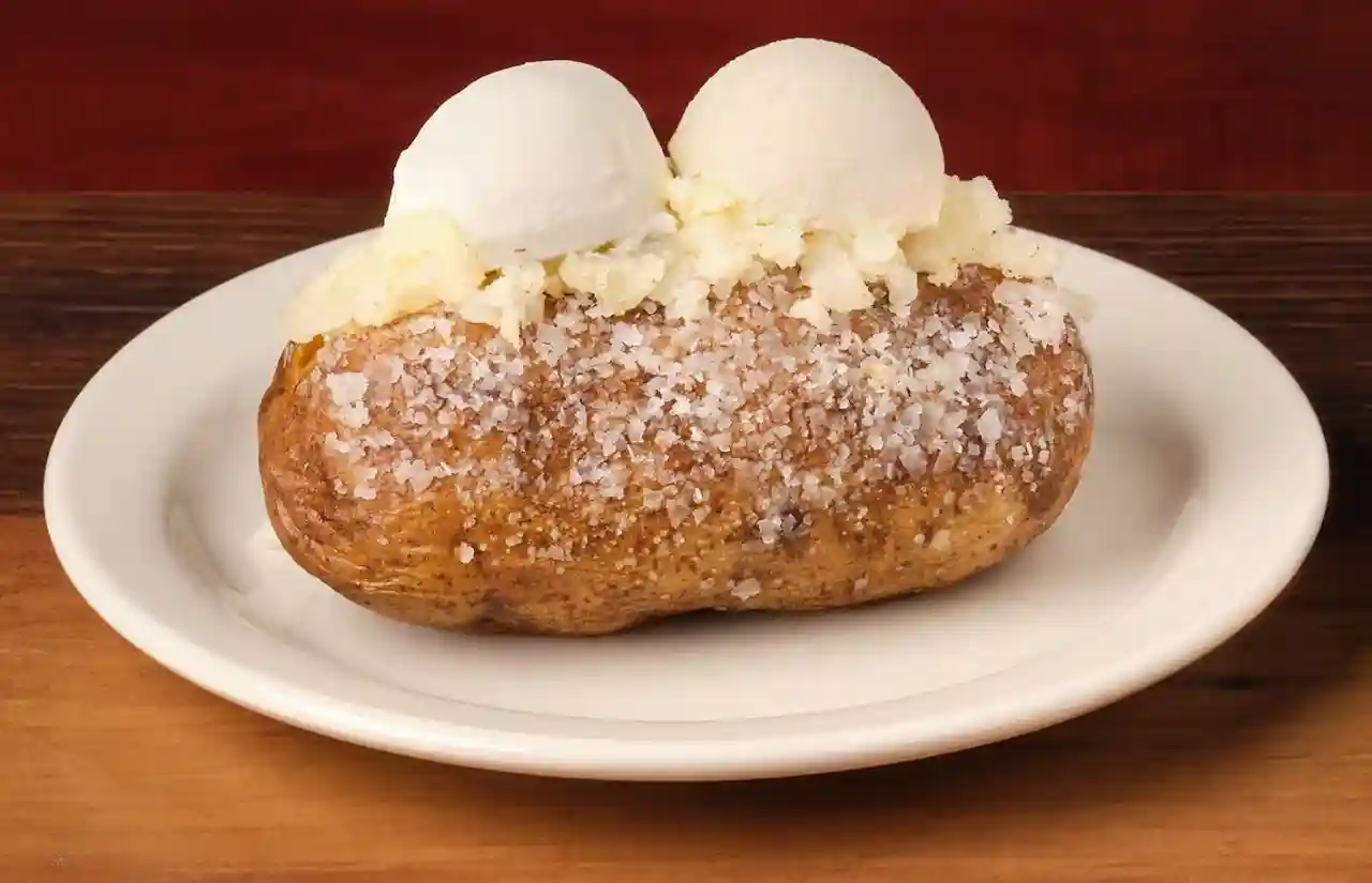home page 63 Plate containing baked potato with creamy white topping