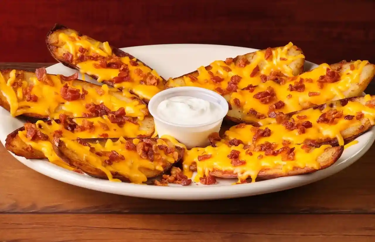 home page 5 Loaded crispy Tater Skins with melted cheese served with sour cream dip
